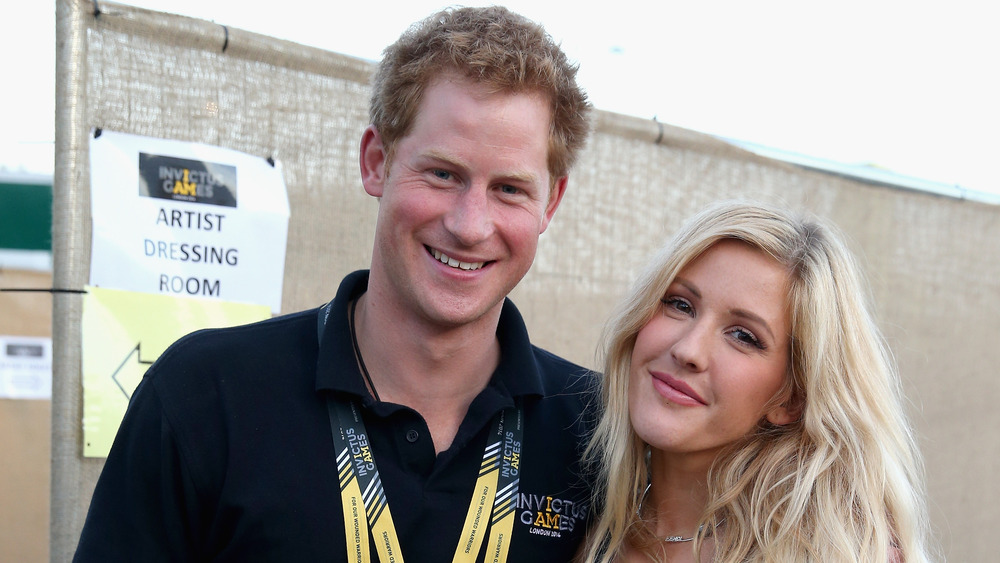 Prince Harry with Ellie Goulding posing