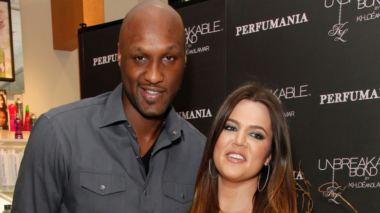 Lamar Odom and Khloé Kardashian posing