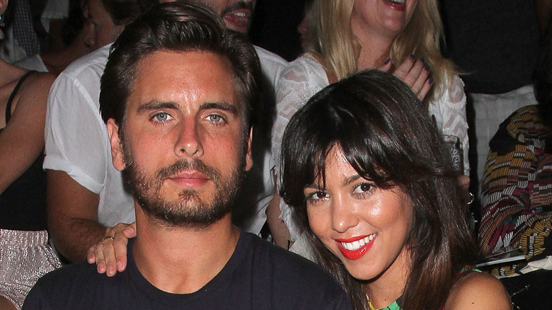 Scott Disick and Kourtney Kardashian posing