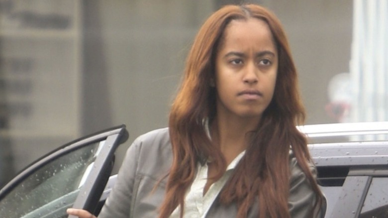 Malia Obama with long red hair