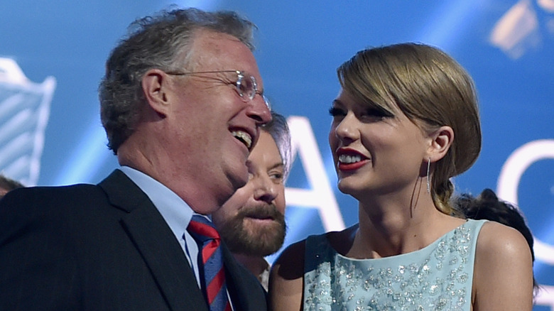 Scott and Taylor Swift laughing