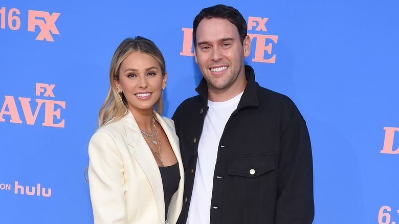 Yael Cohen and Scooter Braun smiling at event