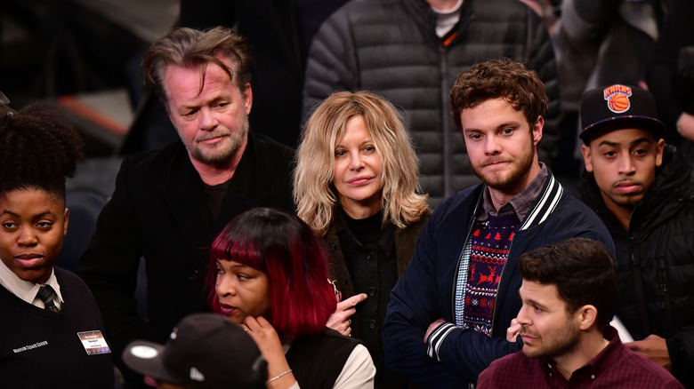 John Mellencamp, Meg Ryan and Jack Quaid at a basketball game.