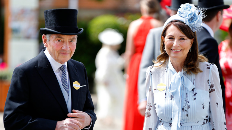 Michael and Carole Middleton smiling, dressed up