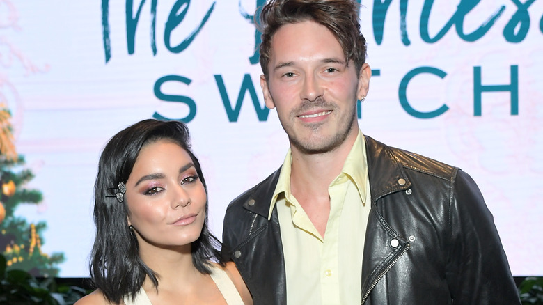 Vanessa Hudgens and Sam Palladio smiling