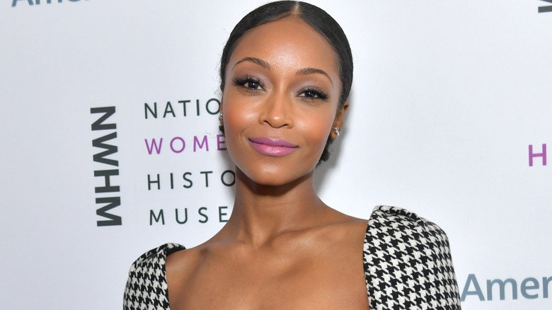 Yaya DaCosta smiling