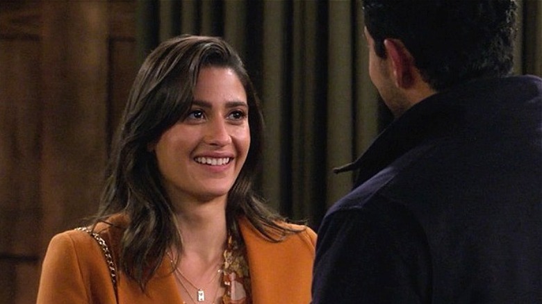 Ashley Reyes smiling on How I Met Your Father