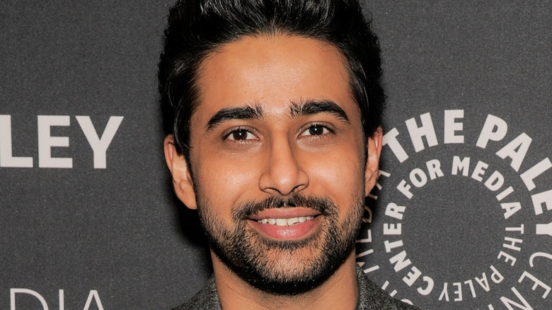 Suraj Sharma smiling