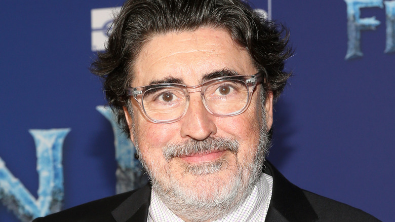 Alfred Molina smiling