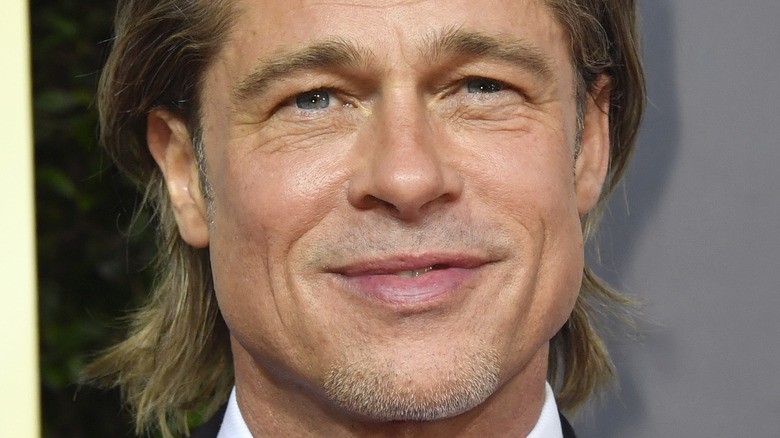 Brad Pitt smiling in tuxedo