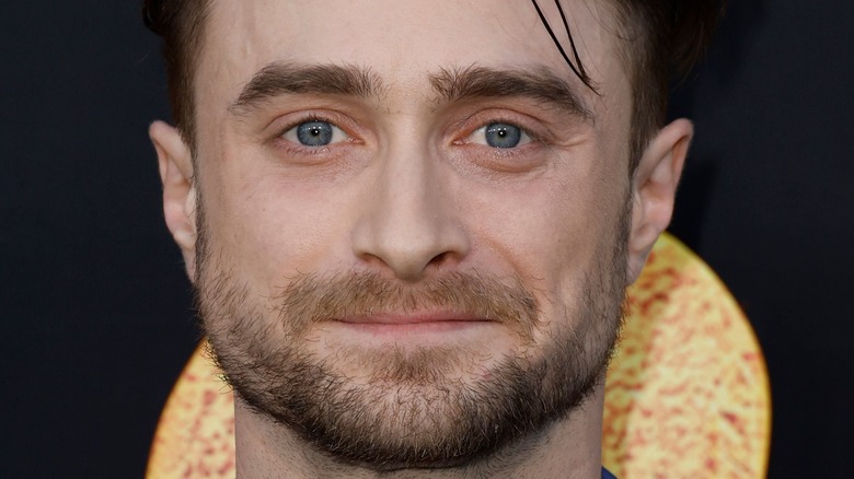 Daniel Radcliffe posing at event