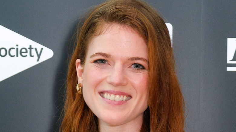 Rose Leslie grinning