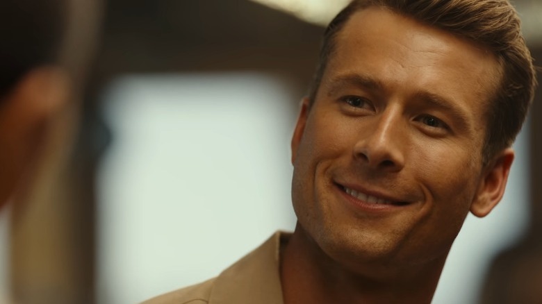 Glenn Powell in Top Gun: Maverick, smiling