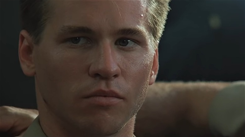 Val Kilmer in the original Top Gun, looking away