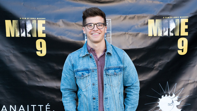 Barrett Carnahan smiling and posing on red carpet