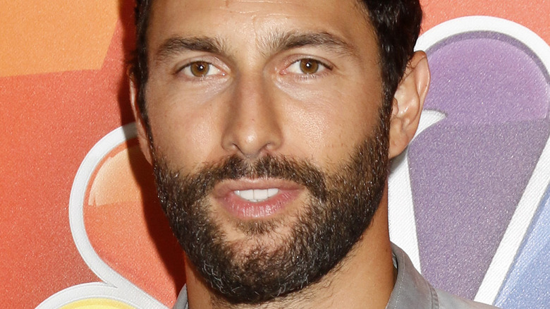 Noah Mills posing