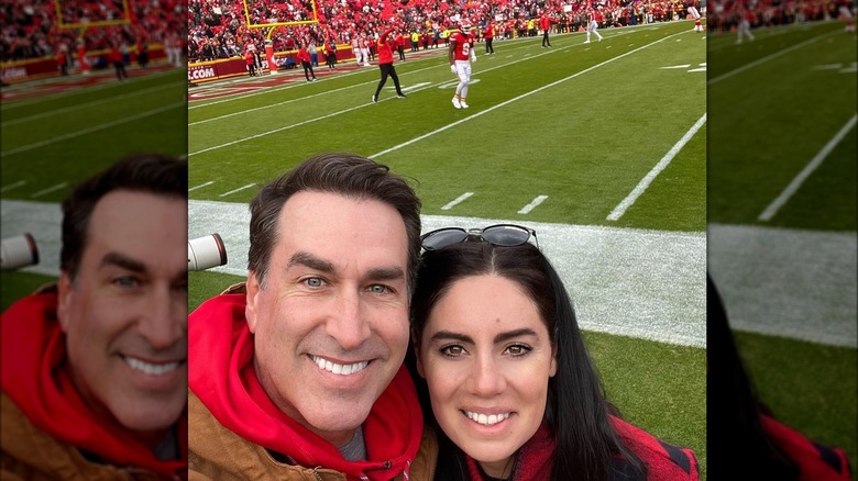 Rob Riggle Kasia Kay on football field