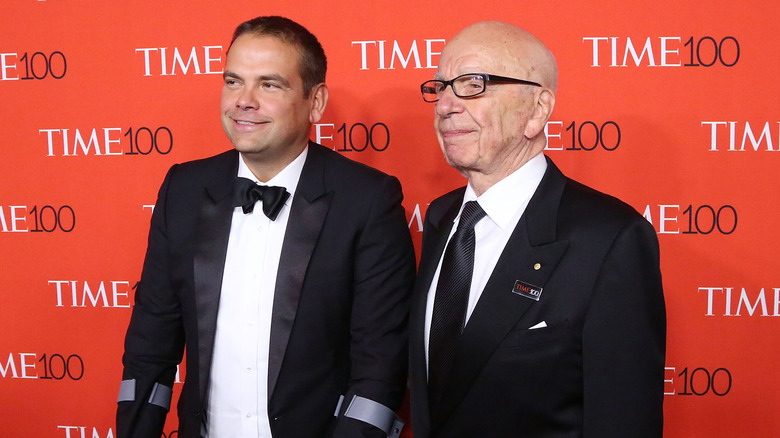 Lachlan and Rupert Murdoch stand together at red carpet event