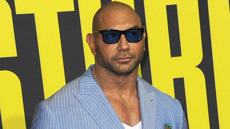 Dave Bautista wearing blue-tinted sunglasses