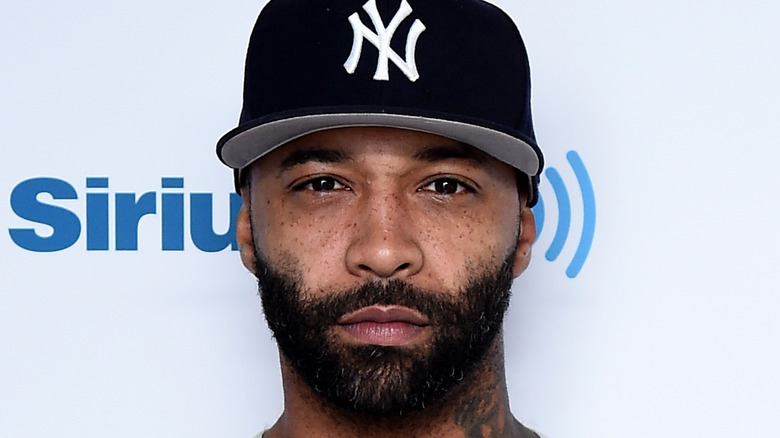 Joe Budden looking at camera with serious expression