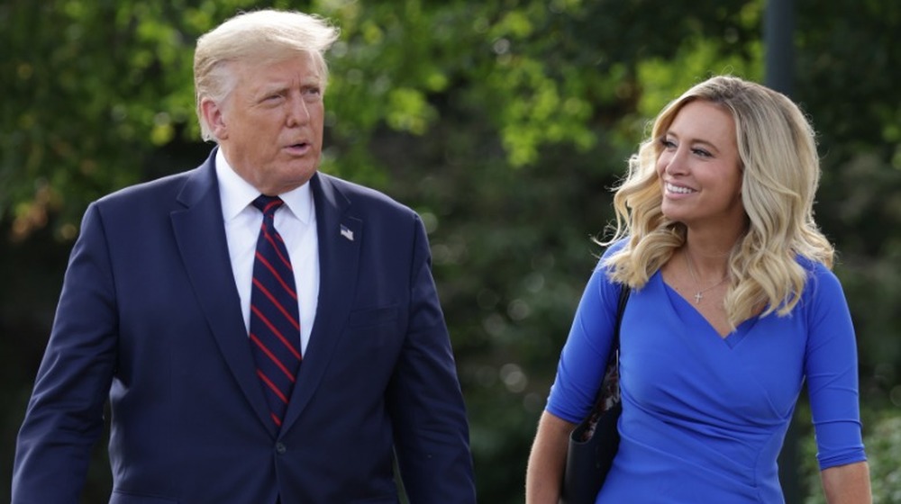 Donald Trump and Kayleigh McEnany walking