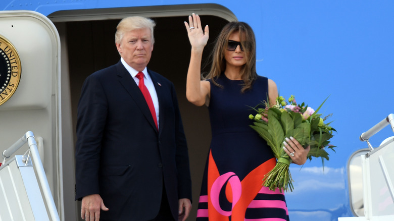 Donald and Melania Trump boarding a plane 