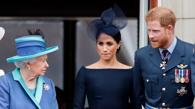 Queen Elizabeth with Meghan Markle and Prince Harry