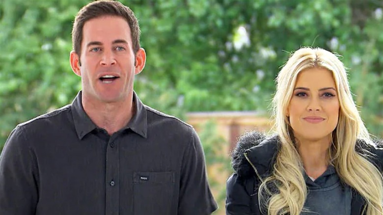 Christina Hall and Tarek El Moussa outside