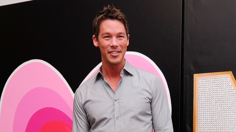 David Bromstad posing at an event.