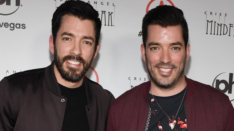 Drew and Jonathan Scott both smiling