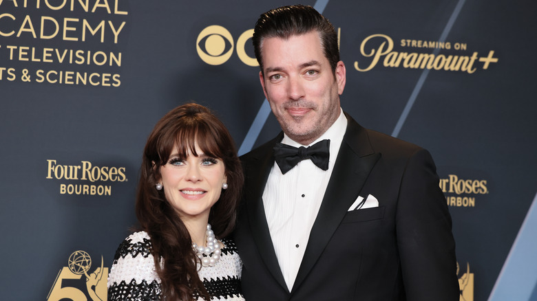 Zooey Deschanel and Jonathan Scott posing