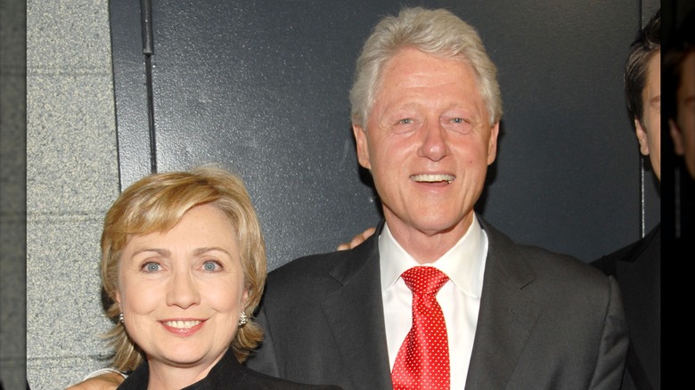 Hillary Bill Clinton red tie