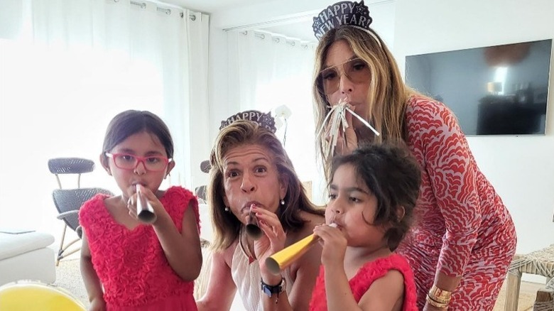 Hoda Kotb posing with her daughters