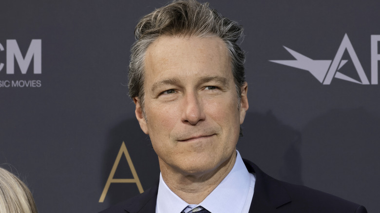 John Corbett smirking