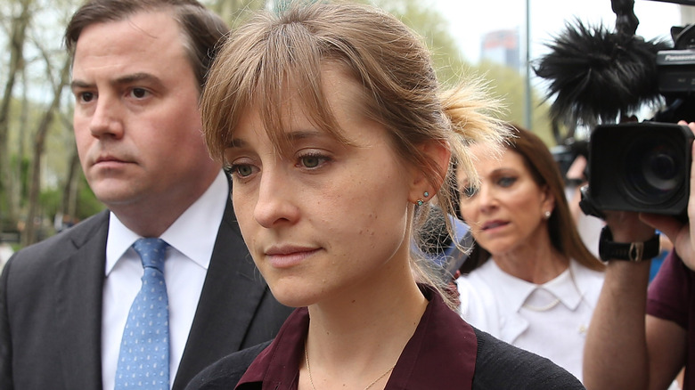 Allison Mack frowning 