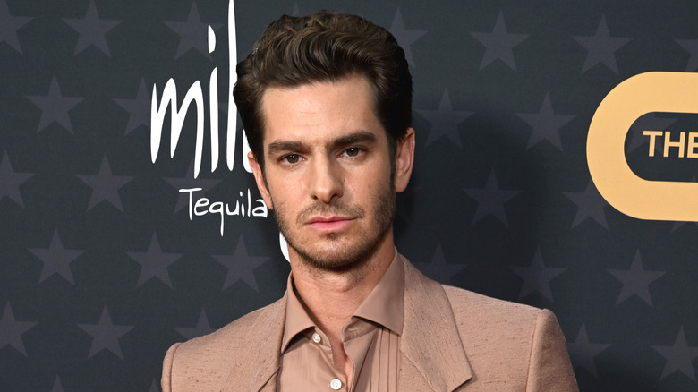 Andrew Garfield posing at an event