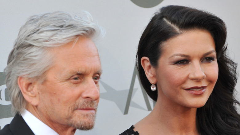 Catherine Zeta-Jones and Michael Douglas together, posing 