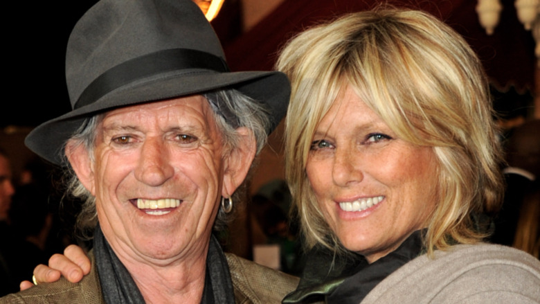 Keith Richards and his wife Patti Hansen, both smiling