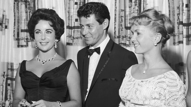 Elizabeth Taylor, Eddie Fisher, and Debbie Reynolds smiling