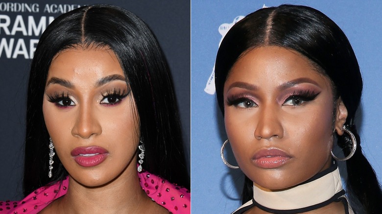 Cardi B posing and Nicki Minaj posing