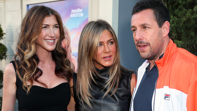 Jackie and Adam Sandler with Jennifer Aniston.