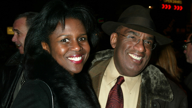 Young Deborah Roberts and Al Roker smiling