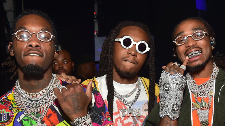 All the Migos wearing glasses