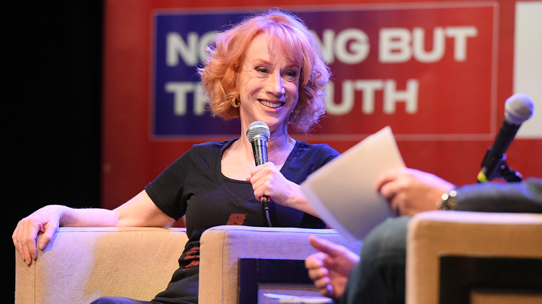 Kathy Griffin holding microphone