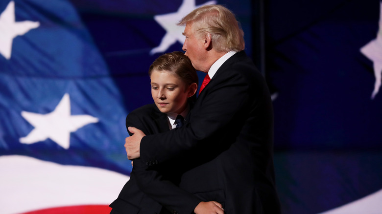 Donald, Barron Trump hugging