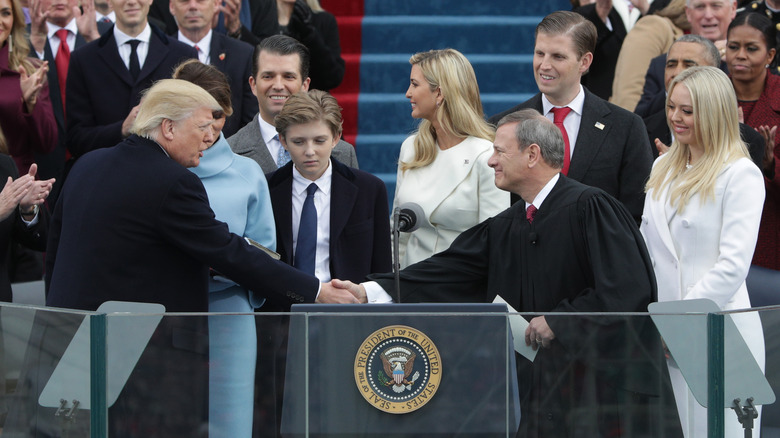 Donald Trump shaking hands