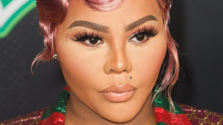 Lil' Kim wearing pink hair