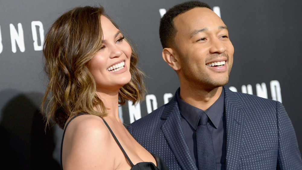 Chrissy Teigen and John Legend smile together