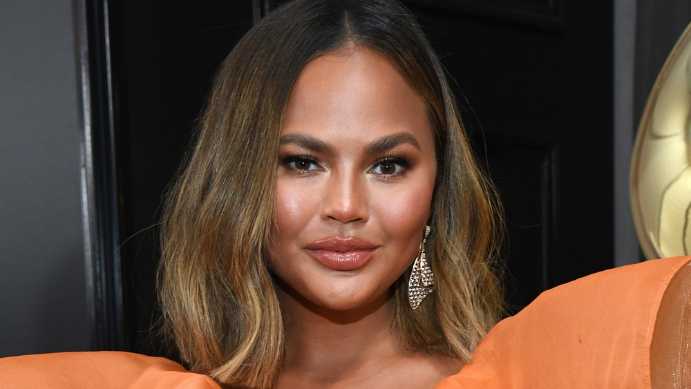 Chrissy Teigen posing on the red carpet