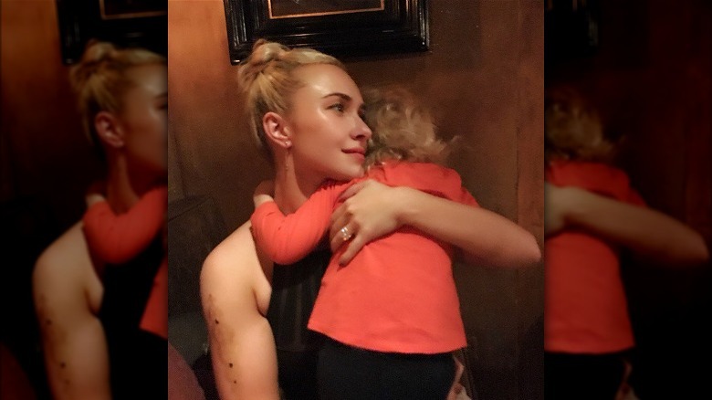 Hayden Panettiere holding her daughter